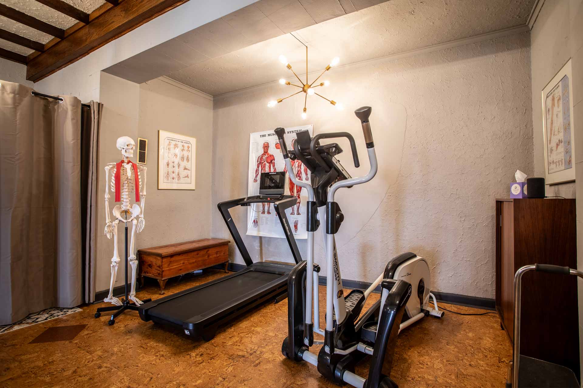 The running giant analysis and elliptical area at the MKE Physical Therapy clinic in Milwaukee.